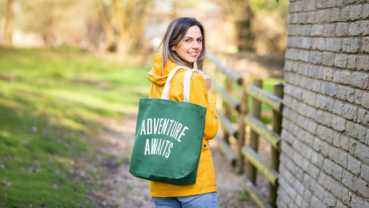 Brambly Trails Founder Jen Looking Back With Adventure Awaits Tote Over Shoulder