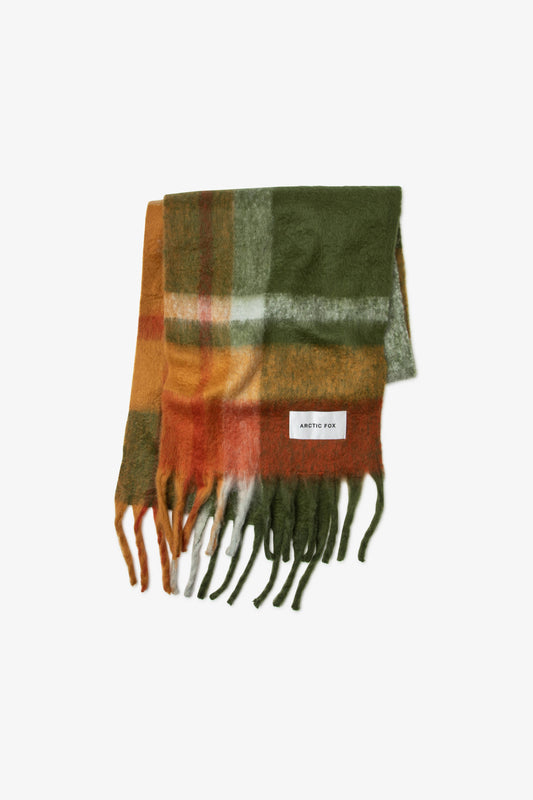 Plaid scarf with fringes on a light gray background