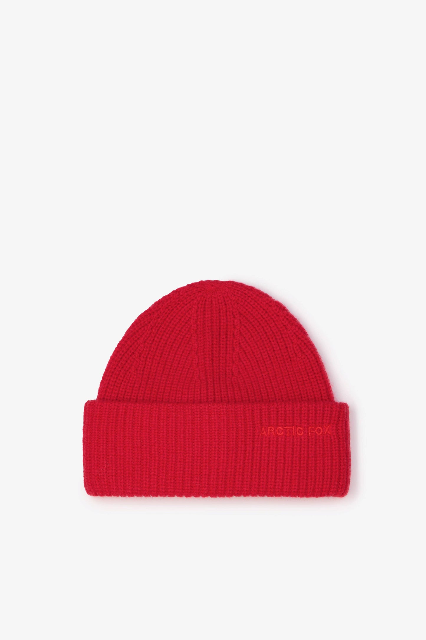Red knit beanie on a white background