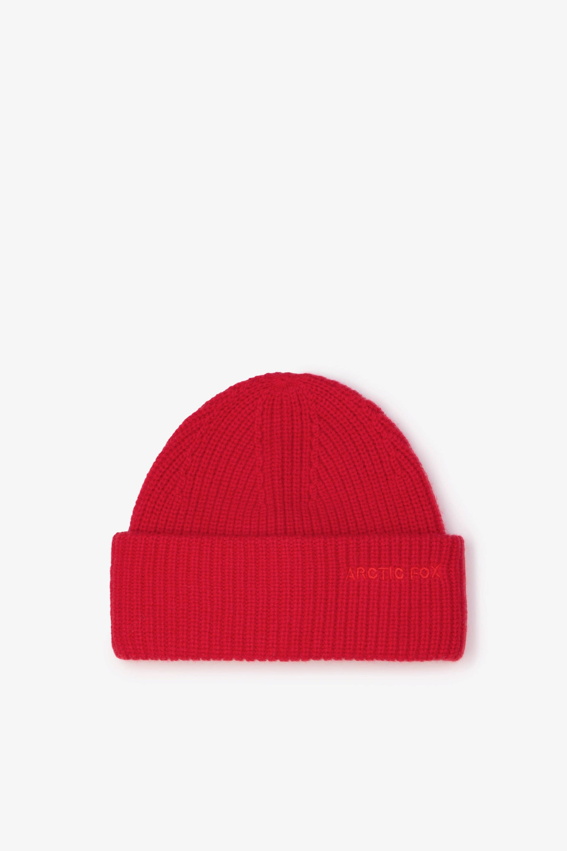 Red knit beanie on a white background